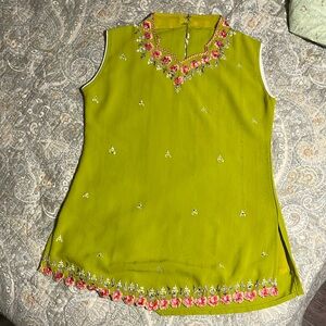 Sleeveless green shirt